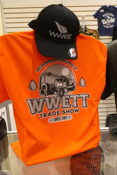 WWETT T shirt on table at merch store