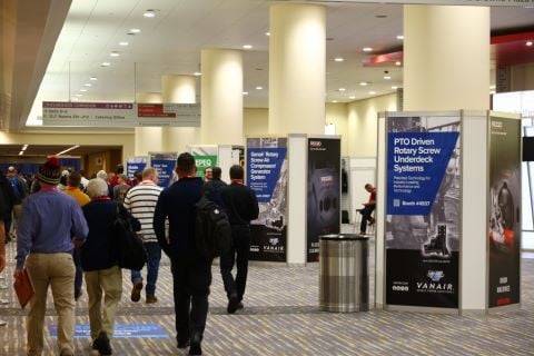 advertisements on panels wrapping columns at WWETT