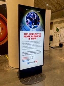 lightbox in front of column on the expo hall floor