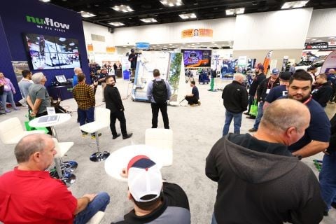 product demonstration in booth on the WWETT Show floor