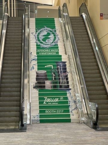 Advertisement up the staircase of the convention center