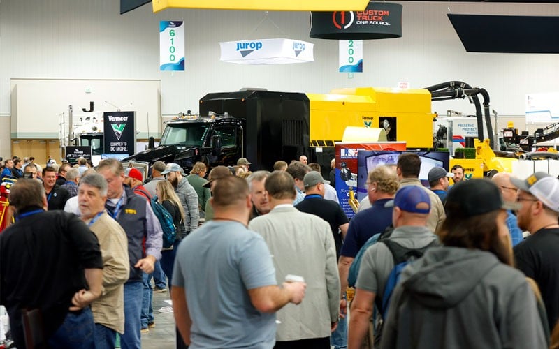 attendees touring the wwett expo hall floor
